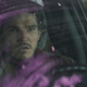 Kazi driving with purple goo on his windshield